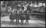 Women of coastal village near Yule Island, possibly Mekeo, wearing jewelry, including kina, a cescent shell valuable necklace