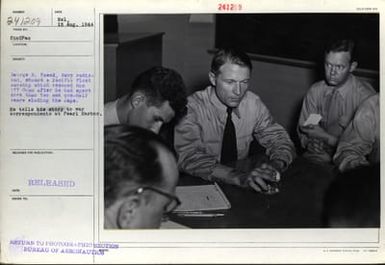 George R. Tweed, Navy Radioman, Aboard a Pacific Fleet Warship Which Rescued Him Off Guam After He Had Spent More Than Two and One-Half Years Eluding the Japanese - He Tells His Story to War Correspondents at Pearl Harbor