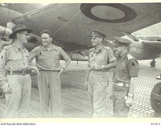 GOODENOUGH ISLAND, NEW GUINEA. 1944-04-22. THE HONOURABLE E.J. WARD, MINISTER FOR EXTERNAL TERRITORIES IN THE AUSTRALIAN GOVERNMENT (2), WITH NX191021 LIEUTENANT-COLONEL A.A. CONLON, DIRECTORATE OF ..