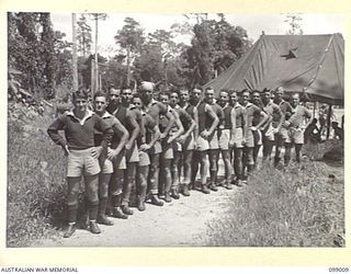 TOROKINA, BOUGAINVILLE. 1945-11-23. "THE REST" AUSTRALIAN RULES FOOTBALL TEAM, WHO PLAYED IN THE MATCH, VICTORIA VERSUS THE REST, ORGANISED AT HQ 3 DIVISION