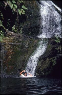 Woman in waterfall, Rarotonga