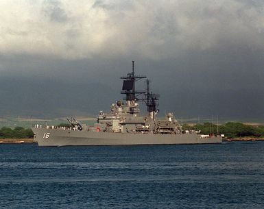 A port bow view of the guided missile cruiser USS LEAHY (CG-16) departing Pearl Harbor