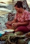 Grating ingredients for vaihu tamoko for fakanoanoa (evening mourning gathering)