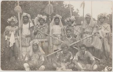 Cook Islands men and women in traditional dress