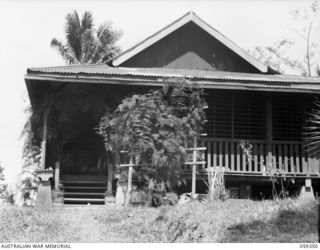 HOPOI DISTRICT, NEW GUINEA, 1943-10-30. MISSION HOUSE AT HOPOI WHICH SERVED AS HEADQUARTERS AND SUPPLY BASE FOR THE AUSTRALIAN AND NEW GUINEA ADMINISTRATIVE UNIT EXPEDITION LED BY NX155085 CAPTAIN ..