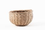 Round coconut leaf basket
