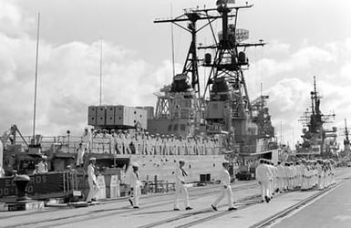 The crew of the destroyer USS RICHARD S. EDWARDS (DD 950) disembarks following the ship's decommissioning