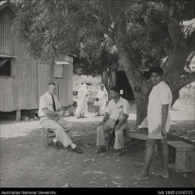 Field Officer speaking with Indian farmer