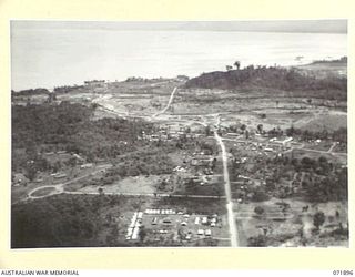 LAE, NEW GUINEA. 1944-03-30. AN AERIAL VIEW OF HEADQUARTERS LAE BASE SUB AREA WITH THE COAST IN THE BACKGROUND