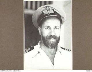 PORT MORESBY, PAPUA. 1942-09. INFORMAL PORTRAIT OF COMMANDER R. B. A. HUNT RAN, NAVAL OFFICER IN COMMAND AT PORT MORESBY