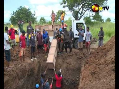 MASS BURIAL