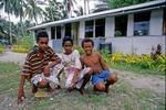 Boys outside school classroom