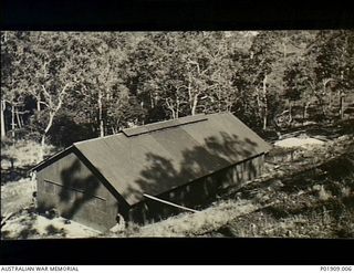 Port Moresby, New Guinea. c. 1942-11. An Anti-Aircraft operations room. The building is made of galvanised iron sheeting