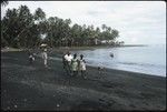 Men and women on beach