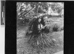 Hawaiian girl in hula costume, Hawaii, ca. 1920-1940