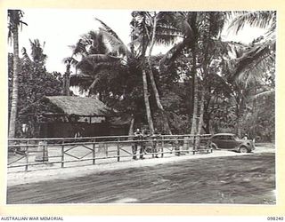 RABAUL, NEW BRITAIN. 1945-10-25. THE QUARTERS OF THE PROVOST SECTION, 11 DIVISION PROVOST COMPANY, AT THE MALAGUNA ROAD BLOCK