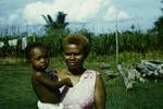 Woman holding a child, Lae