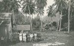 A Tahitian family in front of his house
