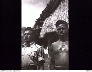 BISIATABU, NEW GUINEA. 1943-10-26. BOTH MM AWARD WINNERS, 7 SERGEANT KARI (LEFT), AND 323 CORPORAL EHAVA, OF THE 1ST PAPUAN INFANTRY BATTALION