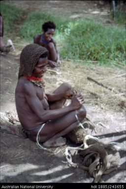 Man making traditional items