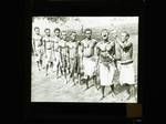 Seven men lining up to take medicine from a man, New Guinea, c1924 to ?