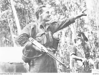 1943-09-15. NEW GUINEA. GOODVIEW JUNCTION. PTE. HARRY PARSONS OF PORT MELBOURNE, VIC., WHO WAS CUT OFF FROM HIS MATES WHILE ON PATROL AT KOMIATUM. BEFORE PARSONS SCRAMBLED TO SAFETY THE JAPANESE ..