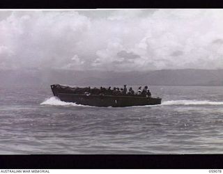 LAE, NEW GUINEA. 1943-10-17. BARGE CONVOY (TILLEY FORCE) OF THE 29/46TH AUSTRALIAN INFANTRY BATTALION. ONE PLATOON PROCEEDED TO BUKAUA AND THE REMAINDER PROCEEDED TO MONGI RIVER TO CLEAR THE ..