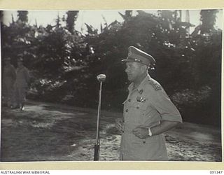 TOROKINA, BOUGAINVILLE. 1945-04-28. MAJOR GENERAL C.H. SIMPSON, SIGNAL OFFICER IN CHIEF, ADDRESSING THE PARADE OF B CORPS SIGNALS, 2 CORPS, DURING HIS VISIT TO BOUGAINVILLE TO INSPECT SIGNAL ..