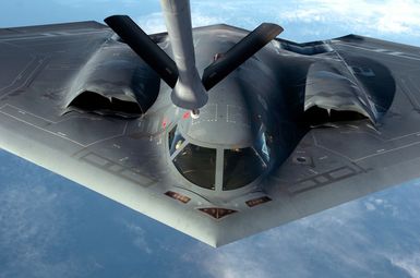 A U.S. Air Force B-2 Spirit"Stealth"bomber, 509th Bomber Wing, Whiteman Air Force Base, Mo., approaches the aerial refueling boom of a KC-135 Stratotanker, somewhere over Guam, Apr. 4, 2005. The Bombers are deployed to Anderson Air Force Base, Guam, as part of a rotation that has provided the U.S. Pacific Command a continous bomber presence in the Asian Pacific region since February 2004, enhancing regional security and the U.S. commitment to the Western Pacific. (U.S. Air Force photo by MASTER SGT. Val Gempis) (Released)