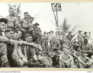 SWAN BEACH, NEW BRITAIN. 1945-01-27. A SECTION OF THE CROWD AT THE 13TH INFANTRY BRIGADE SWIMMING CARNIVAL ORGANISED BY VX14794 LIEUTENANT W.J. TULLICK, AMENITIES OFFICER, 13TH INFANTRY BRIGADE
