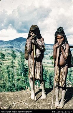 Two girls wearing ordinary dress