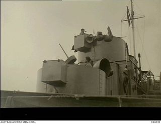 Kwiara, New Guinea. 1943-07-03. An anti-aircraft gun aboard the small vessel George Peat (AB 20) at the 1st Australian Water Transport Group (Small Craft) Maintenance Base which is situated on the ..