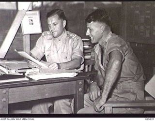 LAE, NEW GUINEA, 1946-01-09. MAJOR K. ROWE, DEPUTY ASSISTANT DIRECTOR OF CANTEENS SERVICE, NEW GUINEA DETACHMENT, AUSTRALIAN ARMY CANTEENS SERVICE (2) AND LIEUTENANT-COLONEL M. B. MOFFATT, ..