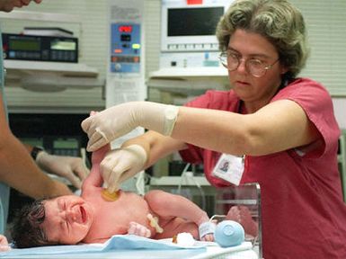 The first Kurdish evacuee to become an American due to her birth on US soil at Naval Hospital Guam is given a basic pediatric examination by US Navy Lieutenant Joyce Siler. The 8 lb. 13 oz. girl was named Helan, which means "leaving" in arabic. Helan will avoid the immigration processing required for the other Kurdish evacuees of Operation PACIFIC HAVEN currently being housed at Andersen Air Force Base, Guam. The operation, a joint humanitarian effort conducted by the US military, entails the evacuation of approximately 2400 Kurds from northern Iraq to avoid retaliation from Iraq for working with the US government and international humanitarian agencies. The Kurds will be housed at...