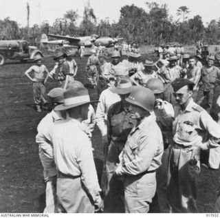 Aitape, North-East New Guinea. 1944-04-23. United States General Walter Krueger, Commander US 6th Army, talks with RAAF officers Air Commodore F. R. W. Scherger, Wing Commander W. A. C. Dale and ..