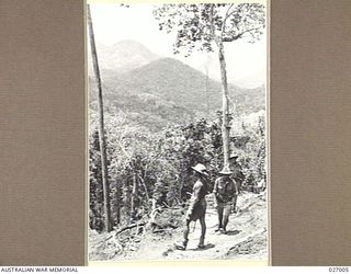 PAPUA, NEW GUINEA. 1942-09. VIEW ACROSS THE VALLEY FROM A HIGH RIDGE NEAR UBERI LOOKING TOWARDS IMITA RIDGE AND OIRABAIWA IN THE DISTANCE. THE JAPANESE ADVANCED TO THE LATTER RIDGE WHILE OUR ..