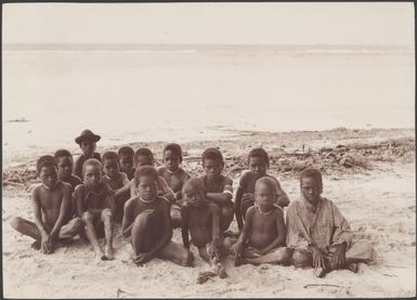 A group of boys on a beach at Buala, Solomon Islands, 1906 / J.W. Beattie