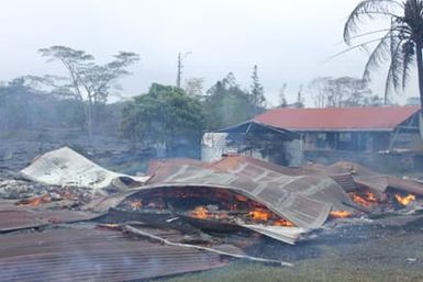 Remains of shed burned down by lava.