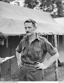 NADZAB, NEW GUINEA. 1944-05-09. INFORMAL PORTRAIT OF SQUADRON LEADER ADRIAN MCGLYNN, SYDNEY, NSW, COMMANDING OFFICER, NO. 23 MEDICAL CLEARING STATION RAAF