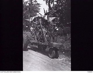 LAE, NEW GUINEA. 1945-12. 3 TON CRANE USED AT 4 ADVANCED ORDNANCE DEPOT