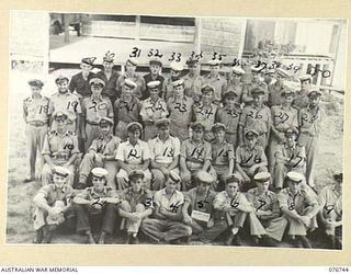 LANGEMAK BAY, NEW GUINEA. 1944-10-23. UNIDENTIFIED  OFFICERS AND RATINGS OF THE RAN STAFF OFFICE