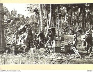 SINGORKAI, NEW GUINEA. 1944-03-19. STORES FOR A PATROL FROM THE PAPUAN INFANTRY BATTALION, TOGETHER WITH EQUIPMENT FOR THE ATTACHED SIGNALS AND CIPHER PERSONNEL ON THE BEACH AT SINGORKAI