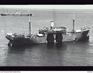 1941-12-24. AERIAL STARBOARD QUARTER VIEW OF THE TRANSPORT YOCHOW WHICH TRANSPORTED AUSTRALIAN TROOPS DURING OPERATION LILLIPUT IN EASTERN NEW GUINEA BETWEEN 1942-12 AND 1943-06. NOTE HOW THE UPPER ..