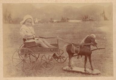 Eric Saville in hat in pony cart, Mailu Island, Papua, c.1907