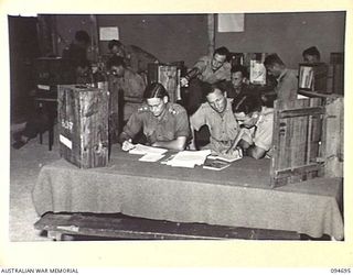 YALU, NEW GUINEA. 1945-08-03. STUDY AND PREPARATION IN THE LIBRARY AT THE NEW GUINEA TRAINING SCHOOL