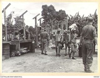 TOROKINA, BOUGAINVILLE. 1945-09-14. A PARTY OF 79 CHINESE ARRIVED BY TRUCK AT TOROKINA COMPOUND. FORMER PRISONERS OF THE JAPANESE, THEY WERE RELEASED WHEN AUSTRALIAN TROOPS OCCUPIED THE JAPANESE ..
