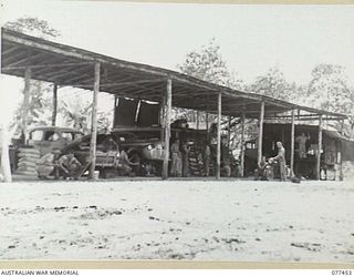 LAE BASE AREA, NEW GUINEA. 1944-12-04. PERSONNEL OF THE 2/77TH LIGHT AID DETACHMENT IN THE UNIT WORKSHOP