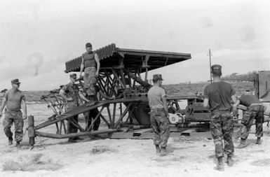 Members of Marine Air Control Squadron 2 (MACS-2) erect an AN/TPS-32 3-D long-range surveillance radar system during Operation KERNAL BLITZ
