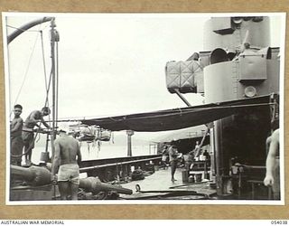 KWIARA, CHINA STRAITS, 1943-07-03. LOOKING DOWN THE PORTSIDE OF THE AB-20 OF THE 1ST AUSTRALIAN WATER TRANSPORT GROUP (SMALL CRAFT)