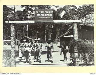 MALAHANG, NEW GUINEA. 1944-04-23. THE HONOURABLE E.J. WARD, MINISTER FOR EXTERNAL TERRITORIES IN THE AUSTRALIAN GOVERNMENT (1), AND MR J. DONOVAN, PRIVATE SECRETARY TO THE MINISTER (2), ACCOMPANIED ..